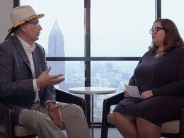 WaziHanska Cook (left) sits across from an interviewer from The New Teacher Center