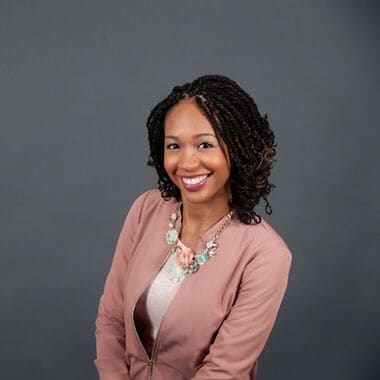 Headshot of Liv Dooley, a Teach For America alumnus.