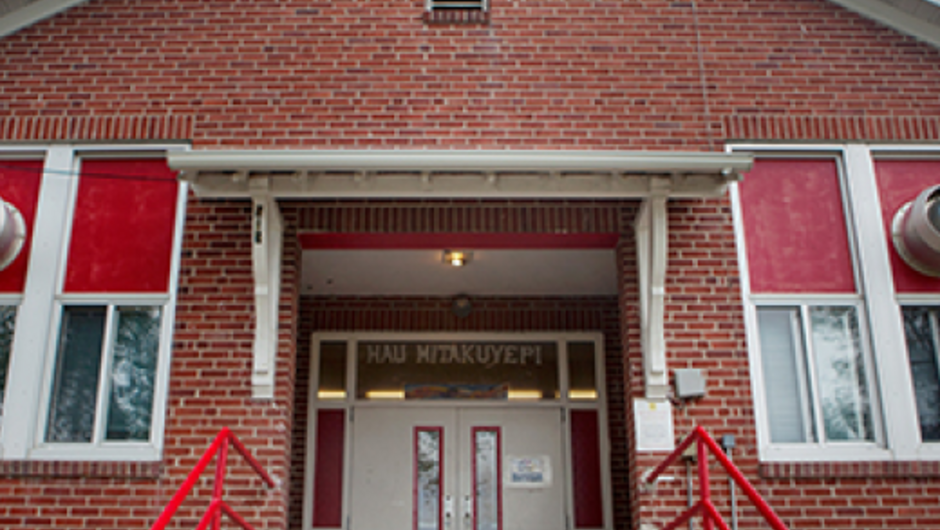 The front of a brick school house