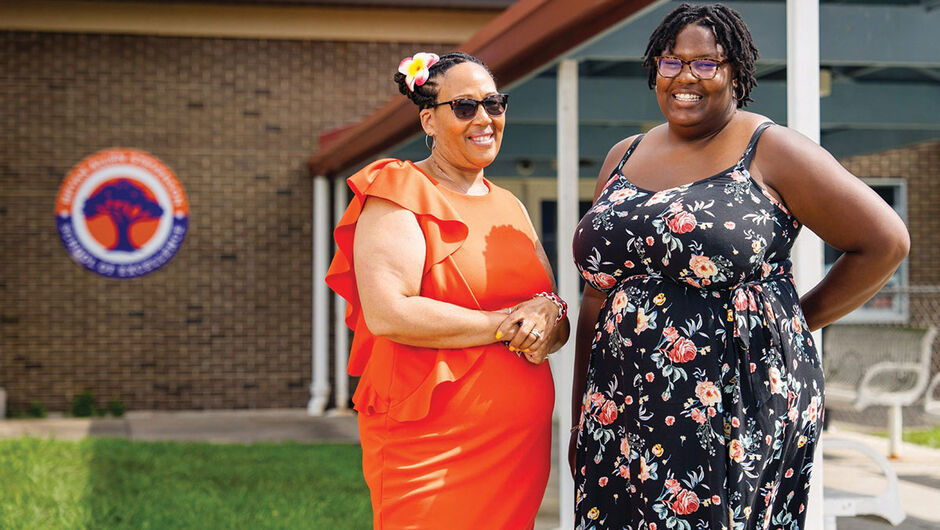 Teresa Berry, school board co-chair and a cousin of Bryan Stevenson, and Chantalle Ashford, head of school for Bryan Allen Stevenson School of Excellence.