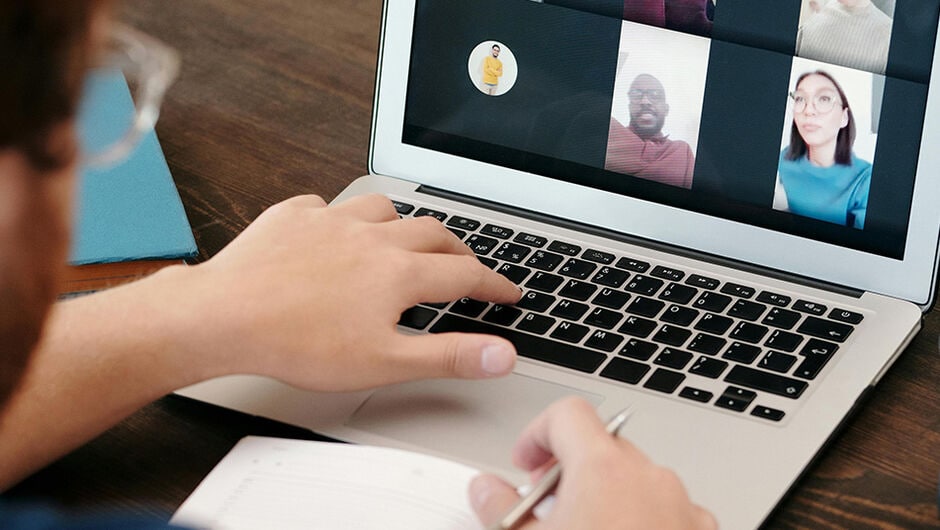 Alt text: A student on a video call with classroom.