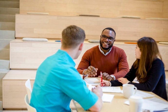 Staff collaborate in national office. 