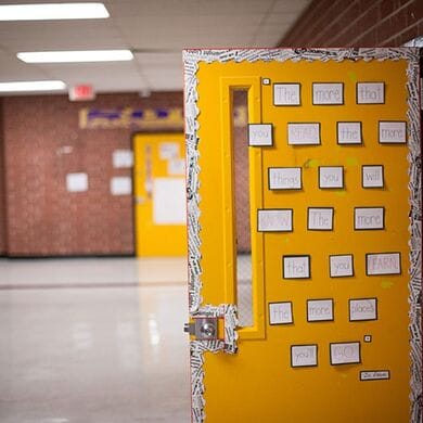 School hallway with yellow door 