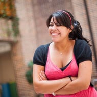 Alumni teaching in the classroom.