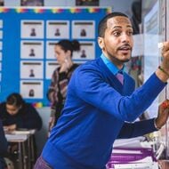 Teacher Writing on Board