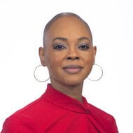 Headshot of a woman in a red shirt