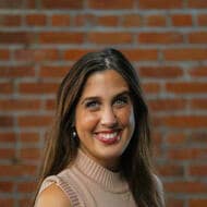 A woman poses for a headshot