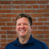 A man poses for a headshot