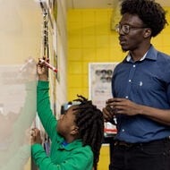 Teach helping student