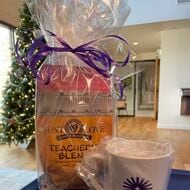 a bag of coffee and coffe mug