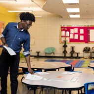 Teachers setting up classroom