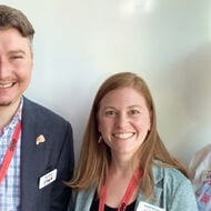 Three alumni standing together